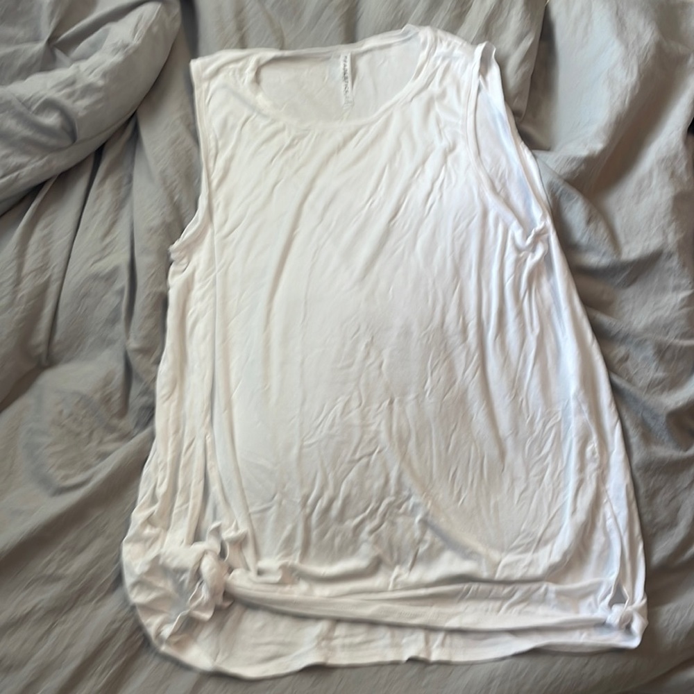 Fabletics white tank top. Size Xl. Worn once. Two ties on bottom. Soft cotton